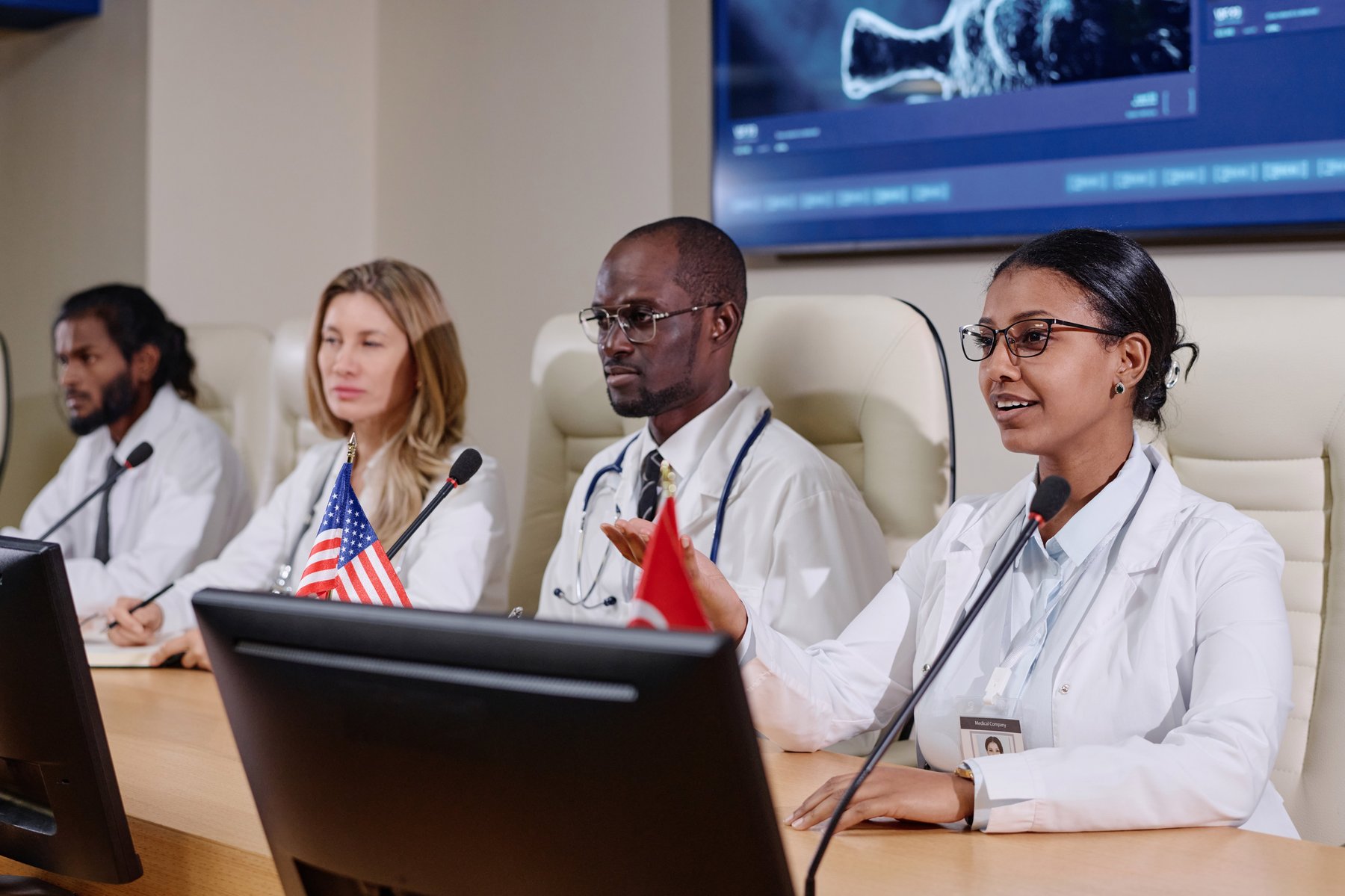 Medical professionals presenting at a research conference