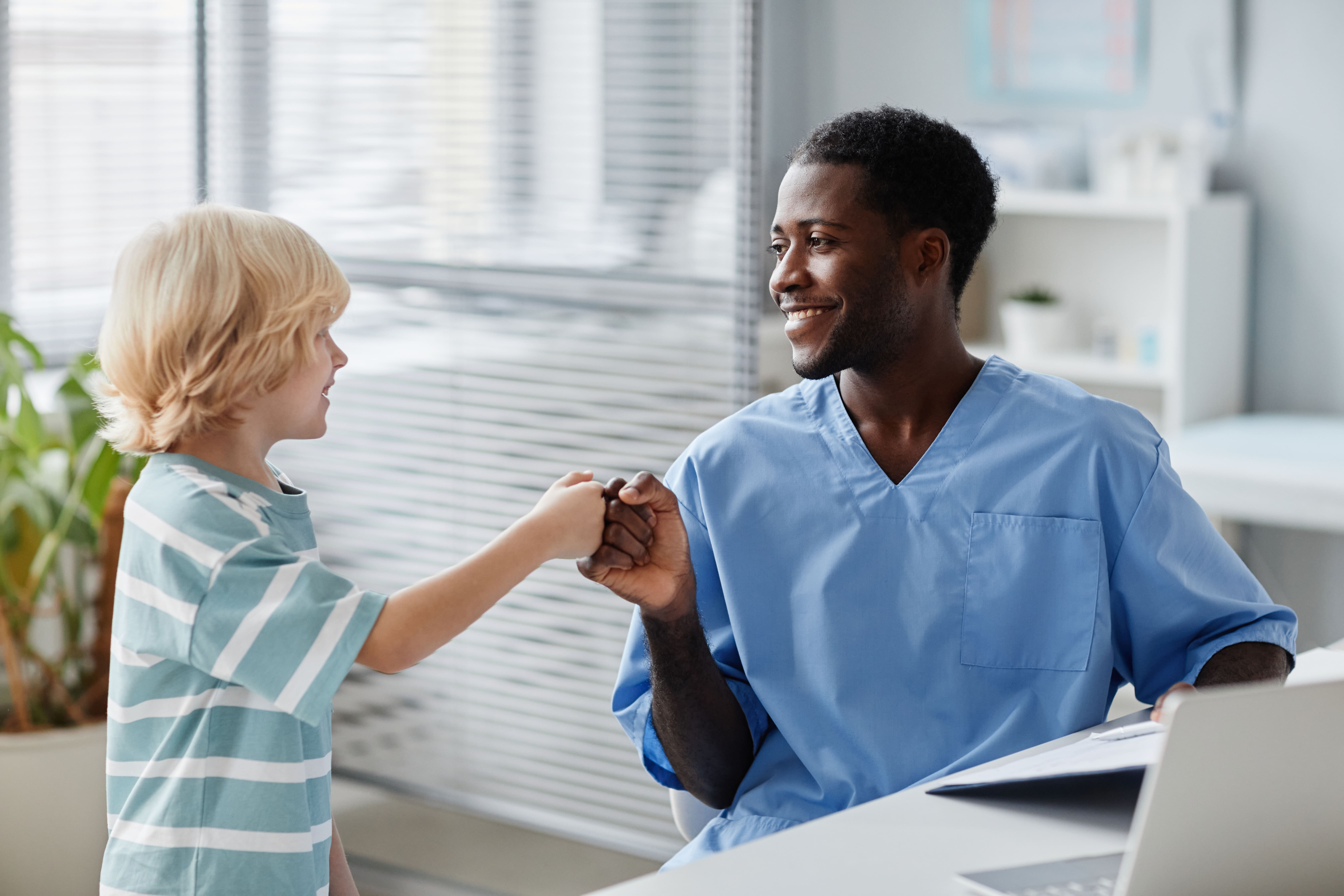 Care team connecting with a young patient