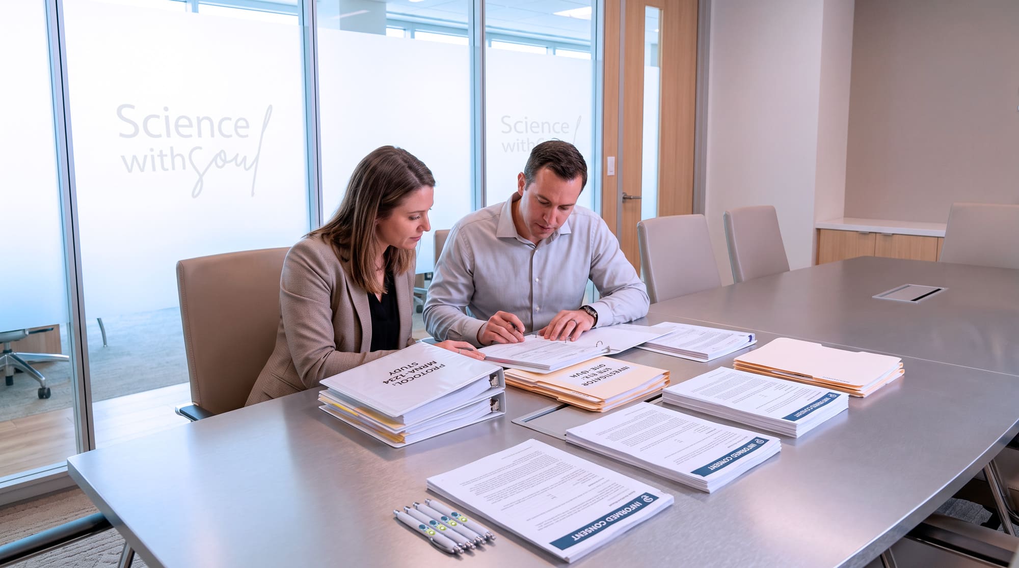 BRCR Global coordinator and principal investigator reviewing study start-up documentation